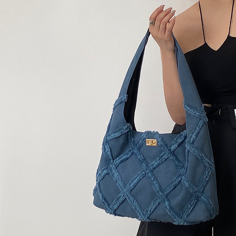 2025 Spring And Summer New Tide Denim Canvas Women's Personalized Street Tassel Large-capacity Shoulder Bag Hundred_voghion.com