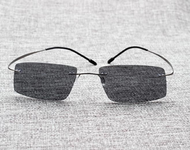 Gli occhiali da sole da uomo con montatura in titanio da guida polarizzata stile Matrix_voghion.com