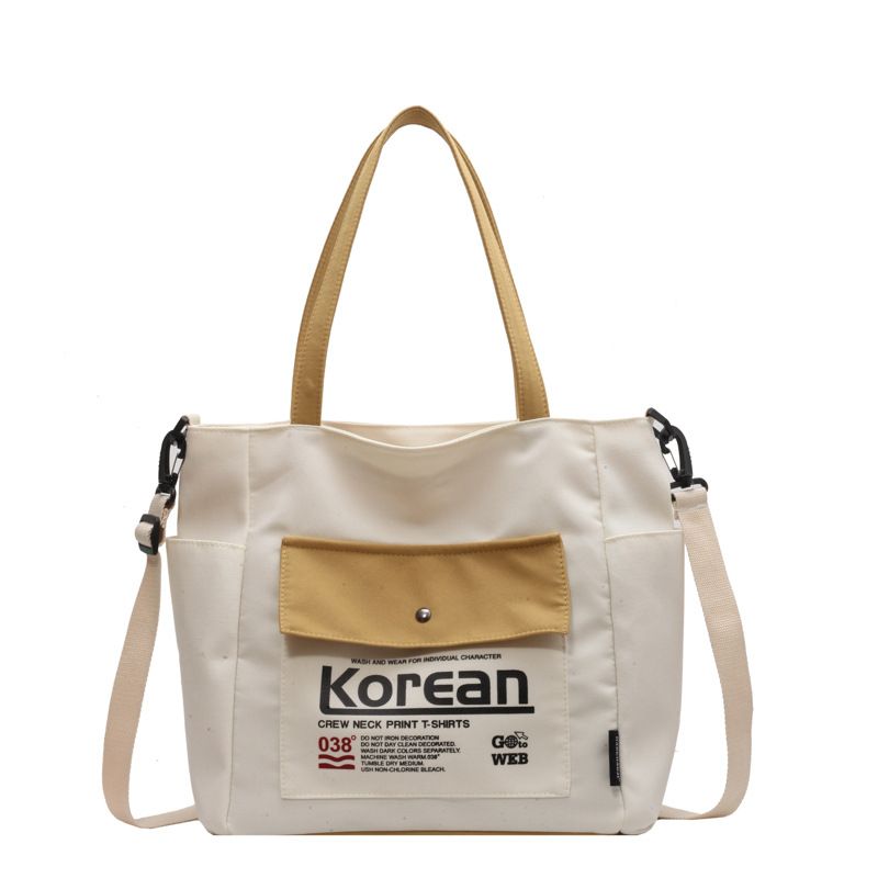 2024 New Large Capacity Thickened Multi Pocket Tote Canvas for Female Students Computer Handheld One Shoulder Crossbody_voghion.com