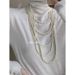 Collana di perle di vetro multistrato collane stile moda con catene di sudore da donna di nicchia impilate per l'autunno e_voghion.com