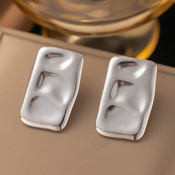 Rechteckiger, plissierter Titanstahl mit übertrieben konkaver, konvexer Oberfläche und goldenem Glanz für Damen_voghion.com