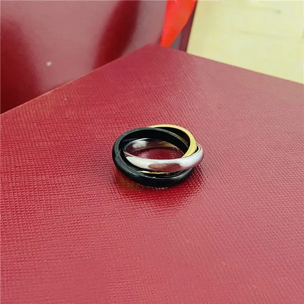 Anello Trinity Anello di fidanzamento Gioielli di design Oro nero Argento 3 anelli Anelli Trinity Donna Uomo Gioielli unisex per_voghion.com