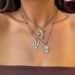 Set di collane a strati in stile western color argento per donna, ciondolo con teschio di toro e cactus con catene di perline, gioielli boho country_voghion.com