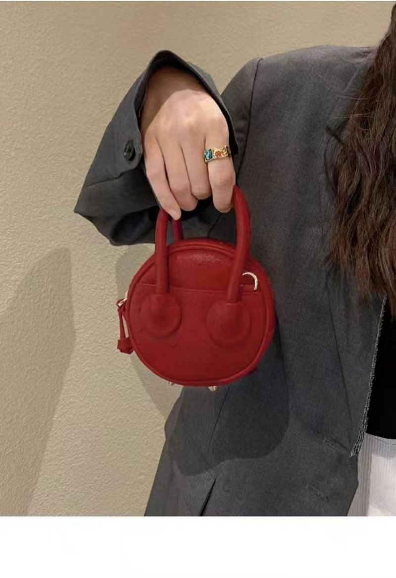 Exquis rouge petit sac rond sac à main femme 2023 été nouveau Niche haut de gamme mini une épaule Messenger petit sac_voghion.com