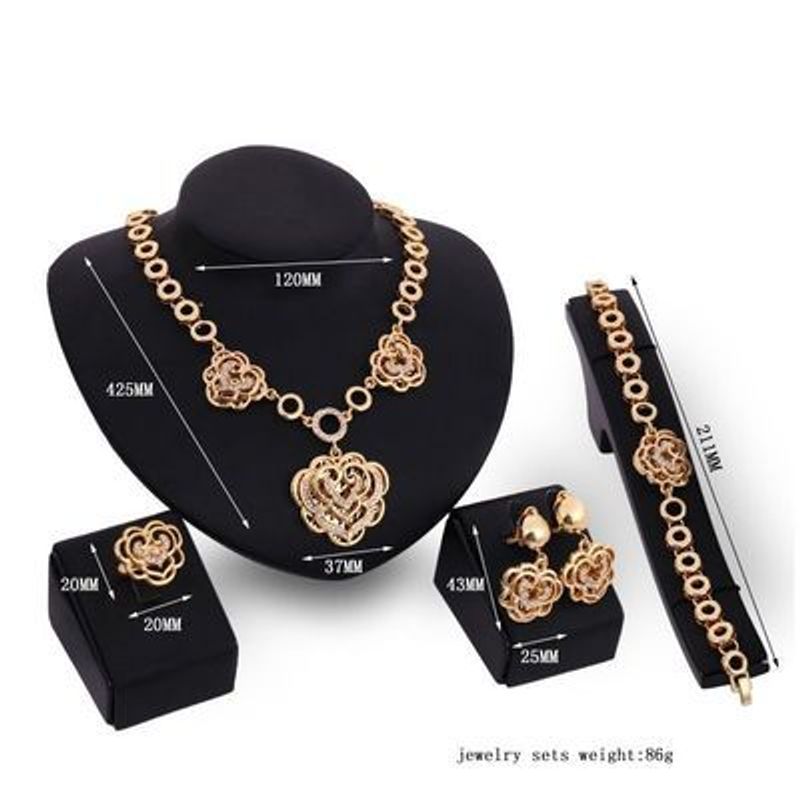 Nouvelle robe de soirée en quatre pièces exagérée parsemée de diamants avec décoration de parure de bijoux en or pour la mariée_voghion.com