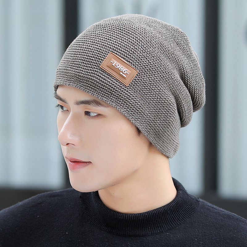 Men's autumn and winter pullover hat, fashionable and minimalist leather label knitted hat, plush and thickened warm ear protection pullover hat_voghion.com