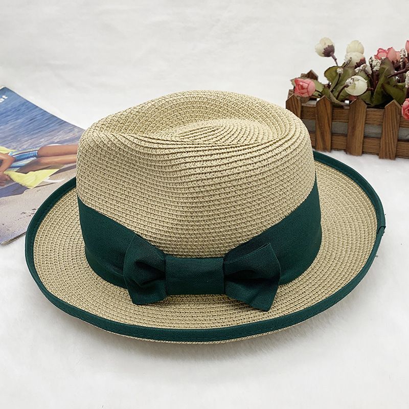 Women's warp-braided summer literary straw hat with rolled edge bow and sunblock with wide eaves_voghion.com