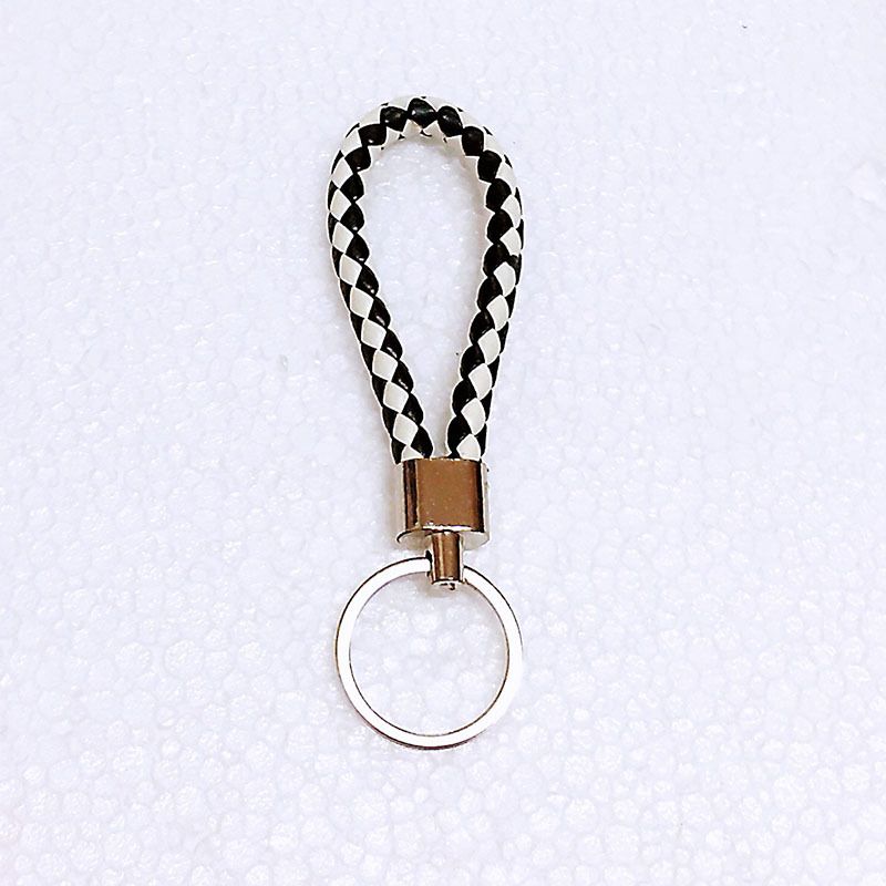 New Woven Leather Rope Creative Backpack Hanger Ground Push Small Gift Car Keychain_voghion.com