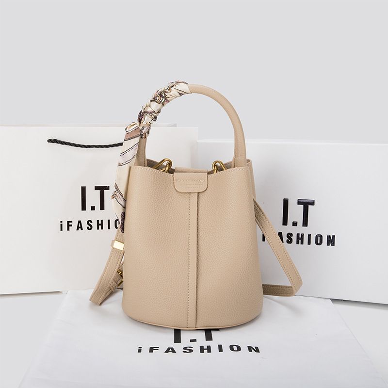 The new leather bucket bag handheld vegetable basket children's bag high feeling large capacity sheet Shoulder strap bag_voghion.com