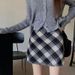 Temperamento: Gonna corta a trapezio snellente in vita alta in lana a quadri rossi per le donne in autunno e inverno 2024_voghion.com