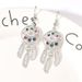 A stylish ear hook design with a dreamcatcher, colorful zircon, elegant earrings, spicy girls, and a unique and personalized earring_voghion.com