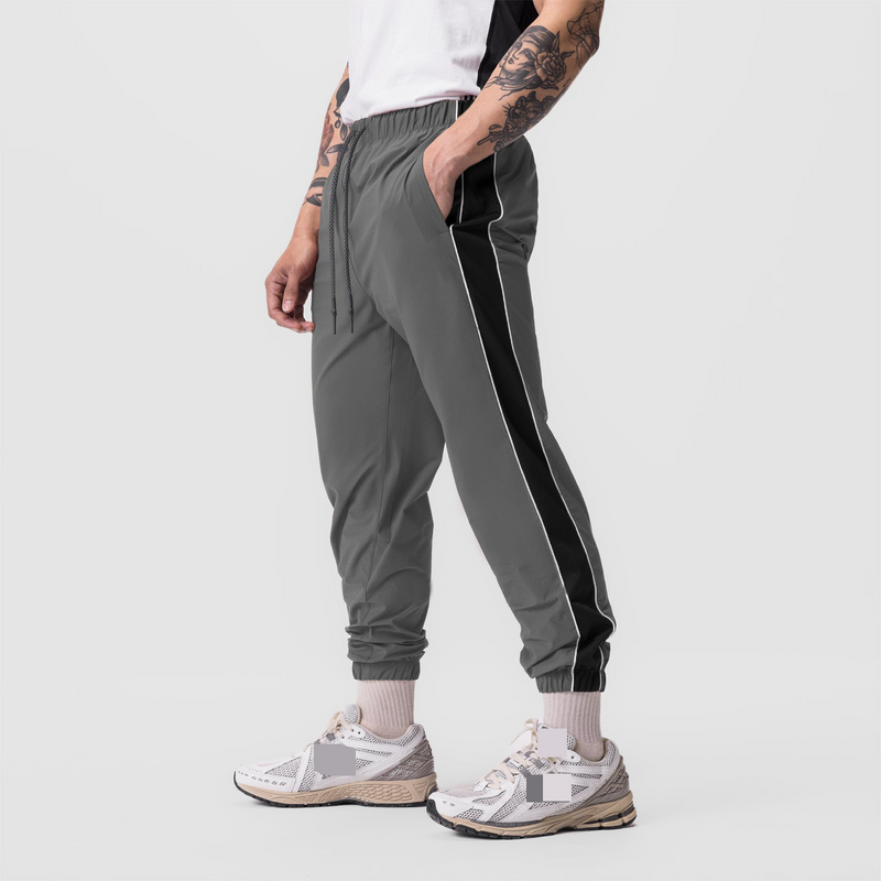 Pantalon de course réfléchissant pour homme - Pantalon de jogging léger et respirant avec empiècements en maille (poignets élastiques à séchage rapide, évacuation de l'humidité, tailles S à 3XL)_voghion.com