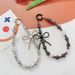 Light Luxury Style Electroplated Bow Inlaid Diamond Beads Mobile Phone Chain Student Bag Pendant_voghion.com