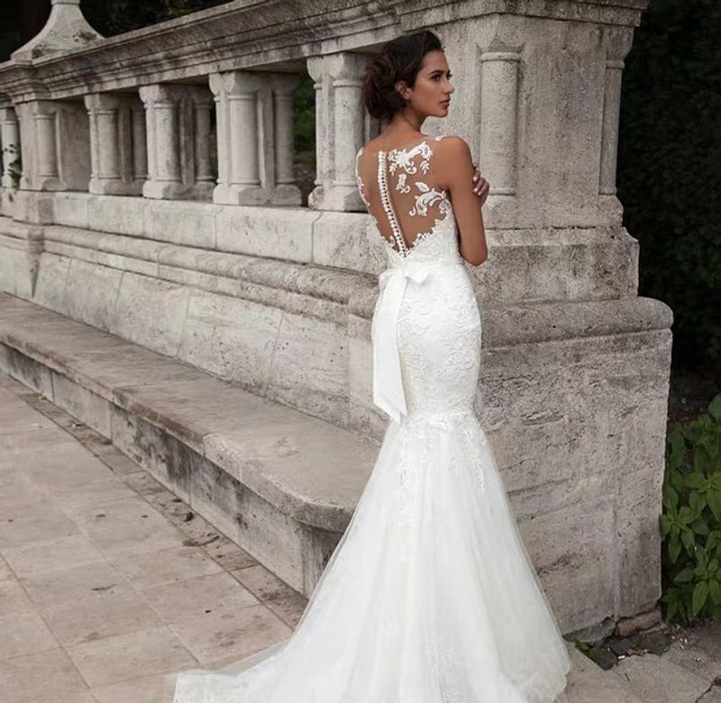 Women's wedding dresses sexy deep V-neck fishtail lace backless wedding dress_voghion.com