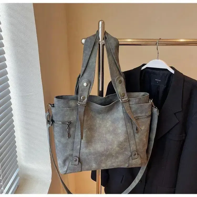 Elegante ma pratica borsa a tracolla unisex in tela alla moda 2025 con ampio spazio di archiviazione_voghion.com