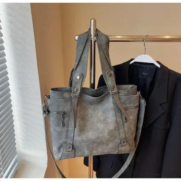 Elegante ma pratica borsa a tracolla unisex in tela alla moda 2025 con ampio spazio di archiviazione_voghion.com