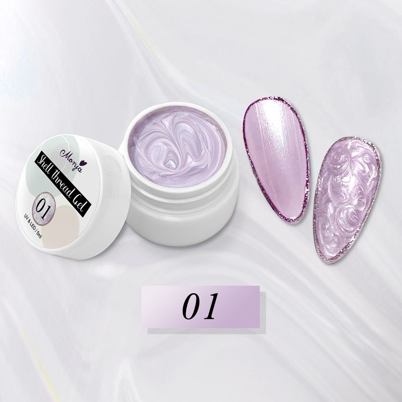 Nuevo y moderno esmalte de uñas en gel con concha y hilo perlado_voghion.com