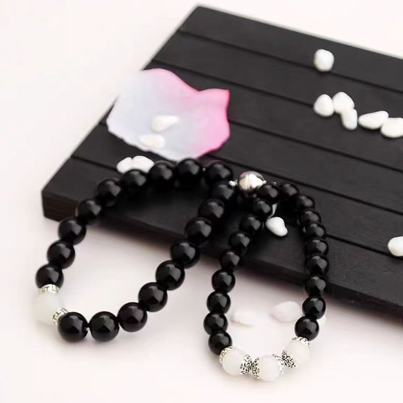 Bracelet de perles rondes en obsidienne à aspiration magnétique, style couple, design de niche, bijoux simples et haut de gamme_voghion.com
