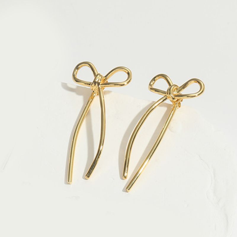 1 paio di orecchini a bottone in stile semplice ed elegante con nodo a fiocco in ABS, rame e zircone placcati in oro 14K_voghion.com