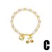 Pulseras con dijes de perla, flor, estrella de mar, cola de pez, chapadas en oro, joyería de mano a juego._voghion.com