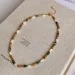 Collana girocollo con perline color oro e dettaglio in conchiglia di pietra naturale multicolore, stile boho chic, regalo per l'uso quotidiano in vacanza._voghion.com