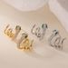 Orecchini di lusso Aogu Niche in rame placcato oro con zirconi a forma di serpente per donna, gioielli alla moda hip-hop_voghion.com