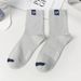Hot Sale Trendy Versatile Mid-Calf Long Letter Sports Four Seasons Men's Business Socks_voghion.com