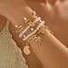 Bohemian Armband Großhandel Europäischen Und Amerikanischen Neue Urlaub Stil Reis Perlen Legierung Conch Shell Anhänger Armband Set_voghion.com