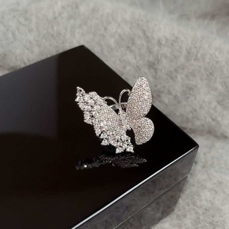 Anello aperto hip hop con zirconi intarsiati in rame per donna, asimmetrico lucido, con diamanti, a forma di farfalla, super fata, resistente allo sbiadimento_voghion.com