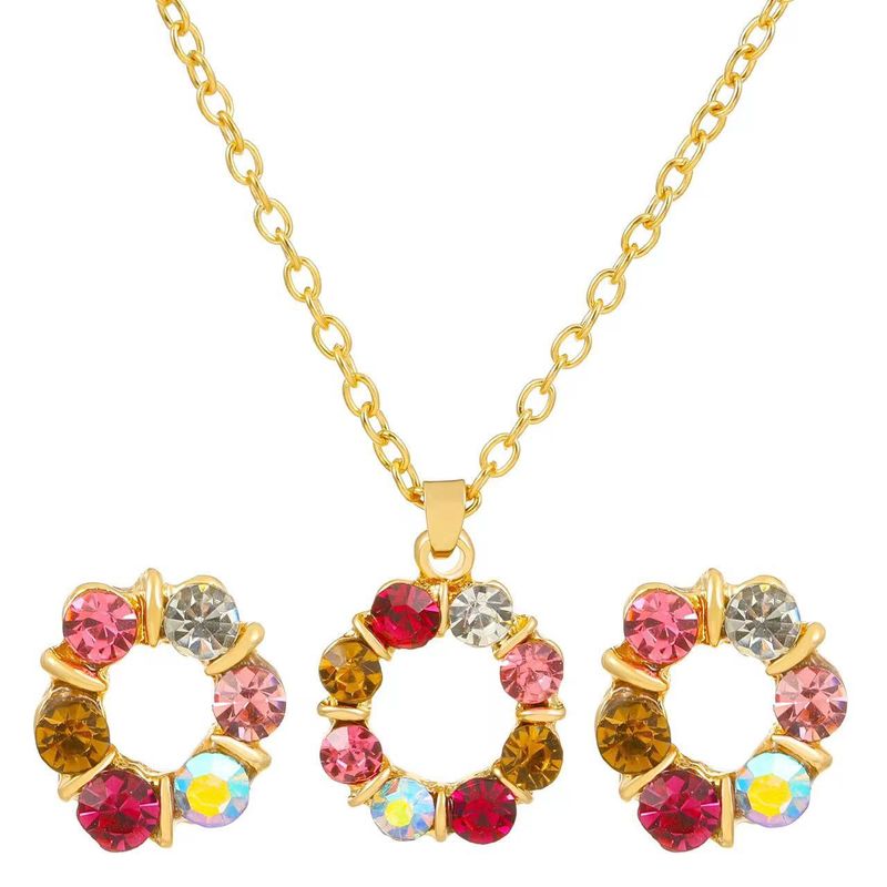 Farbiges Diamant-Schmuckset für Frauen Modische Persönlichkeit Temperament hohle runde Anhänger Halskette Ohrringe Armband_voghion.com