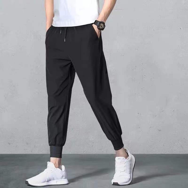 Abbigliamento da uomo Pantaloni di seta di ghiaccio di fascia alta Pantaloni casual elasticizzati da uomo Pantaloni lunghi dritti sottili da uomo di mezza età e giovani elasticizzati in vita sportiva_voghion.com