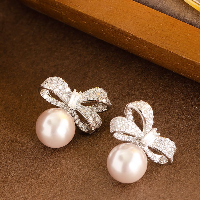 Süßer und duftender Stil mit diamantbesetzter funkelnder Zirkonia-Schleife, Perlenohrringen, femininem Charme, vielseitigem Silber_voghion.com