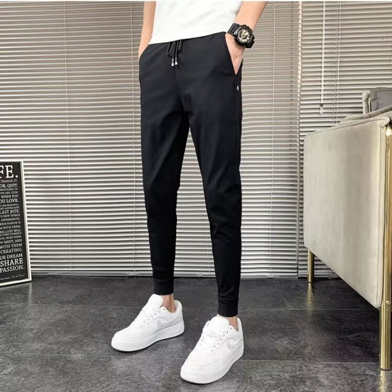 Abbigliamento da uomo Jeans lavati azzurri Pantaloni skinny elasticizzati slim da uomo Primavera e autunno 2024 Pantaloni harem da uomo_voghion.com