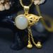 Collana con ciondolo in giada Hetian con montatura in argento e nappa - Design semplice ed elegante a forma di zucca Yuanbao per le donne, regalo ideale_voghion.com