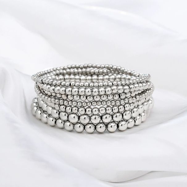 Set di bracciali con perline minimalisti per donna - Confezione da 7 bracciali in resina fatti a mano Boho impilabili in oro e argento_voghion.com