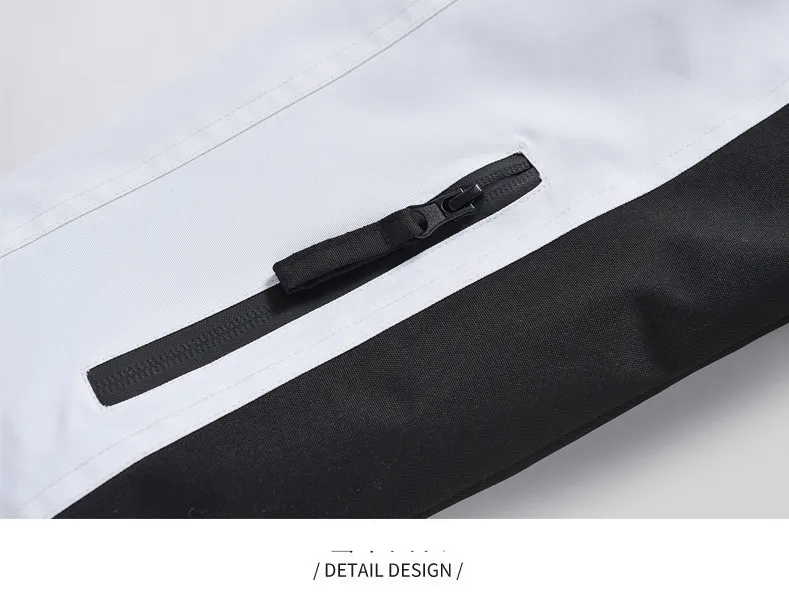 Jauns ziemas vīriešu un sieviešu vēja necaurlaidīgs, ūdensnecaurlaidīgs, silts un elpojošs vienvietīgs un divvietīgs slēpošanas kostīms, kā arī kokvilnas slēpošanas kostīms_voghion.com