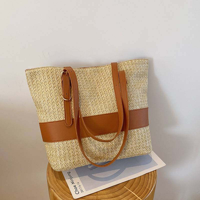 Summer 2025 New Leisure Woven One-shoulder Straw Bag Simple Trend Portable Tote Bag Female Large Capacity Bag_voghion.com