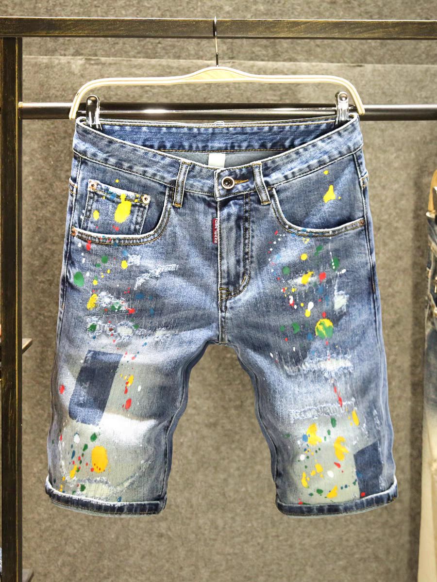 Pantaloncini estivi alla moda con colori a contrasto, jeans strappati da uomo, pantaloncini larghi con schizzi d'inchiostro alla moda._voghion.com