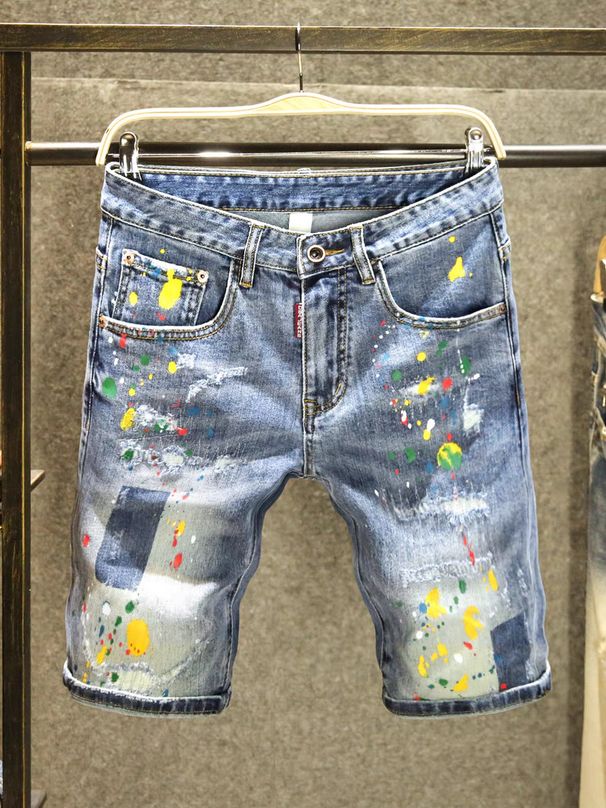Pantaloncini estivi alla moda con colori a contrasto, jeans strappati da uomo, pantaloncini larghi con schizzi d'inchiostro alla moda._voghion.com