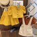 Børnetøj til piger med korte pufærmer, top med shorts, moderigtigt jakkesæt med to dele_voghion.com