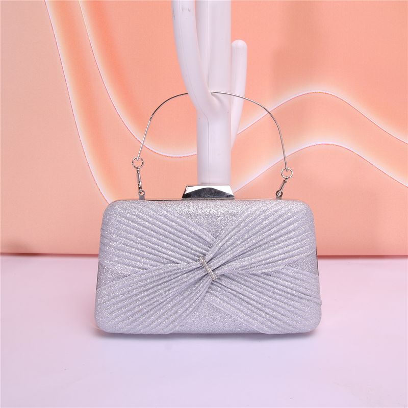 Stile caldo della stagione, squisita ed elegante borsa da sera alla moda con pochette in tessuto a rombi, per incontri sociali._voghion.com