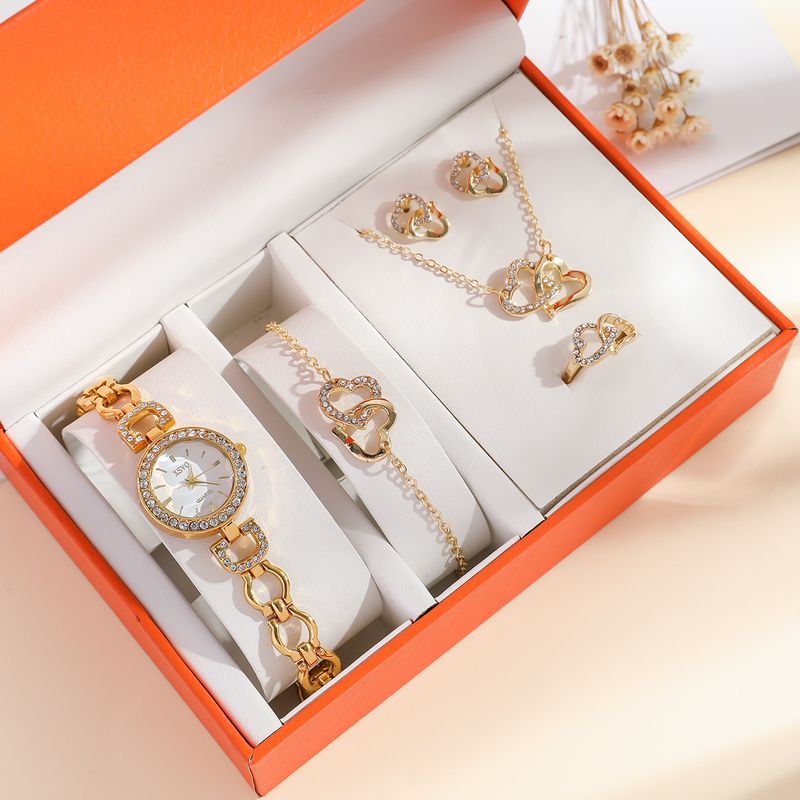 Ladies new watch set gold diamond temperament versatile hollow strap ladies quartz watch set_voghion.com