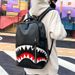 2025 New Men's Graffiti Printing Fashion Shark Mouth Casual Fashion Backpack Daily Commuting Shoulder Bag_voghion.com
