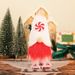 Decorazione per vetrine di Natale transfrontaliera con statuetta di un vecchio senza volto e bambola in piedi Rudolph_voghion.com
