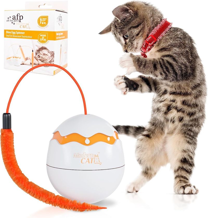 Dino Egg Spinner Cat Toy 4" x 3.3" x 3.5"; White Robotic Cat Toy; ABS Automated Cat Toys; 360 Degrees Rotation Spinning Cat Toy; Poly Robot Cat Toy; P_voghion.com