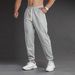 Neue Herren-Jogginghose für Frühling und Herbst, schmale Passform, zulaufendes Bein, lässig, vielseitig, Sporthose für Jugendliche, Outdoor-Training._voghion.com