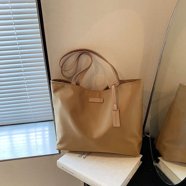 Borsa tote versatile in nylon casual di grande capacità per le donne 2024 nuova alla moda in tinta unita con tracolla e texture versatile_voghion.com