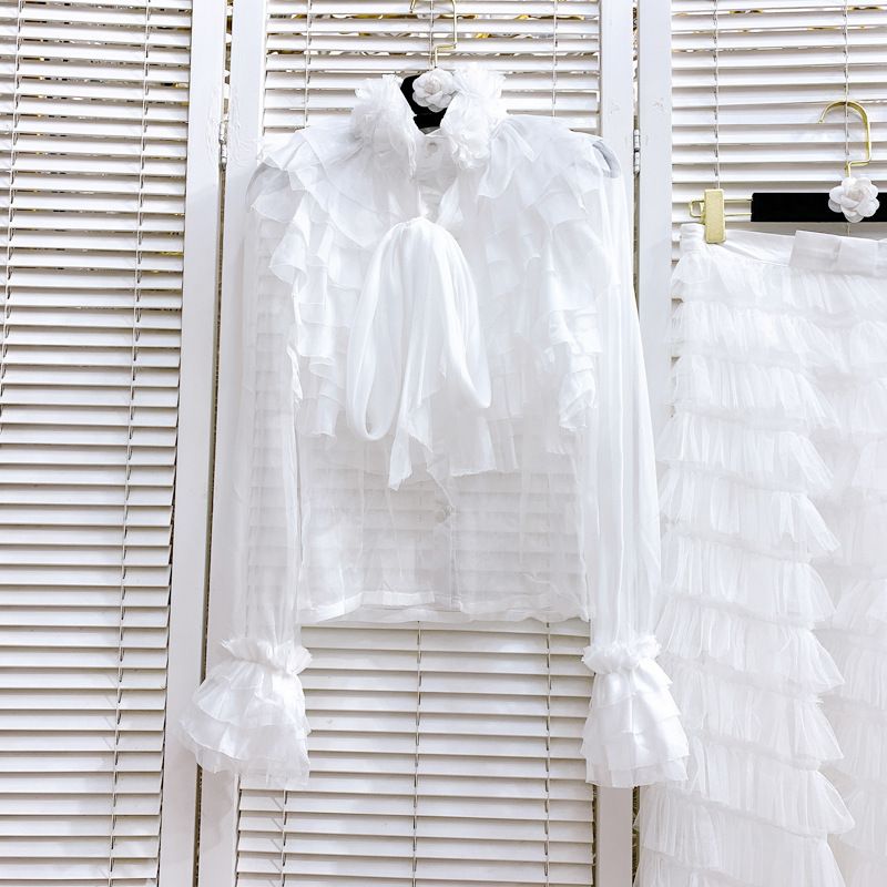 Abbigliamento da donna Camicia in chiffon arricciato Primavera Nuovo design Camicia Gonna a torta sovrapposta a strati in rete_voghion.com