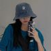 Korean version versatile washed denim letter basin hat for women, simple and casual, summer shading, revealing face,_voghion.com
