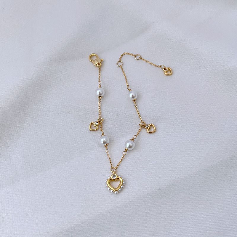 Nuovo design di nicchia alla moda, elegante bracciale multi-ciondolo a forma di cuore con perle intarsiate placcate in oro_voghion.com